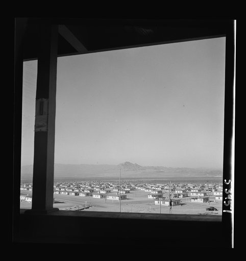 Untitled photo, possibly related to: Las Vegas, Nevada. A view from a watchtower, showing the Basic Magnesium Incorporated plant, its 1,000 unit housing development, transmission lines and roads