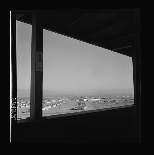Untitled photo, possibly related to: Las Vegas, Nevada. A view from a watchtower, showing the Basic Magnesium Incorporated plant, its 1,000 unit housing development, transmission lines and roads