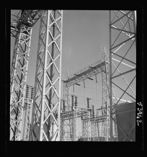 Untitled photo, possibly related to: Las Vegas, Nevada. A mass of transmission towers and transformers redistributing power from Boulder Dam to Basic Magnesium Incorporated, which produces huge quantities of the lightest of all metals for aircraft and other wartime manufacturing