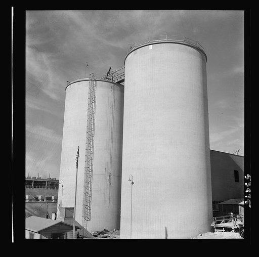 Untitled photo, possibly related to: Las Vegas, Nevada. Giant silos, eighty-four feet high, for the storage of ore for the manufacture of magnesium at the Basic Magnesium Incorporated plant in the southern Nevada desert.