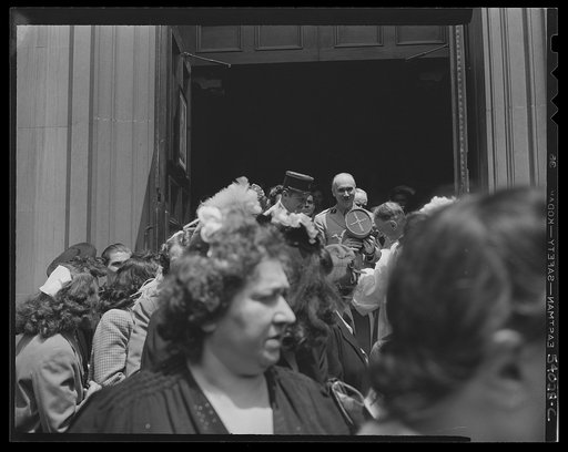 New York, New York. June 6, 1944. Noon mass at Saint Vincent de Paul's Church on D-day