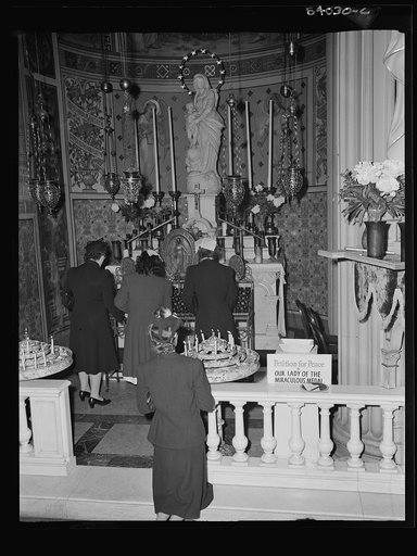 New York, New York. June 6, 1944. Noon mass at Saint Vincent de Paul's Church on D-day