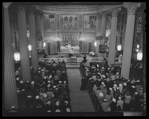 New York, New York. June 6, 1944. Noon mass at Saint Vincent de Paul's Church on D-day