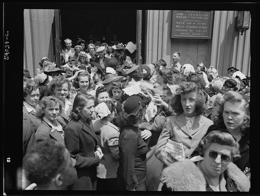 New York, New York. Noon mass at Saint Vincent de Paul's Church on D-Day