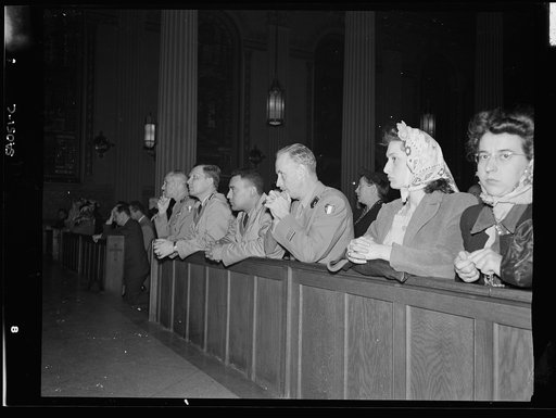 New York, New York. June 6, 1944. Noon mass at Saint Vincent de Paul's Church on D-day