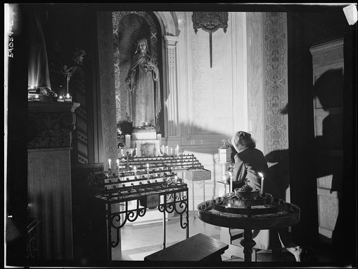 New York, New York. Noon mass at Saint Vincent de Paul's Church on D-day
