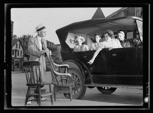 The Hardwick Victory Store is back in operation and scenes like this are again being witnessed daily. This picture shows a typical transaction of business: Raymond Duby, in buggy, buying a commode. George Slayton and Guy Larabee lend a hand loading the furniture