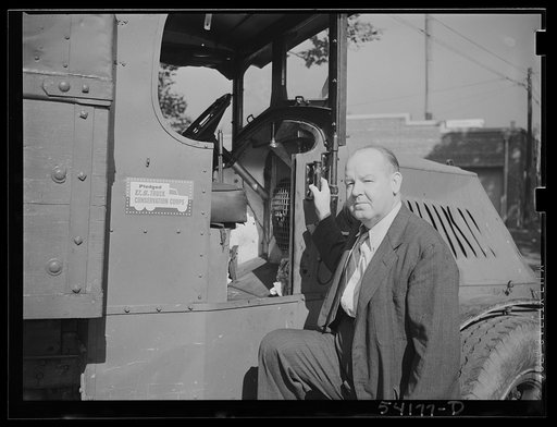Washington, D.C. A Jaeger truck-transit mixer, showing a man operating the mixer. On the door of the truck is the United States Truck Conservation Corps pledge