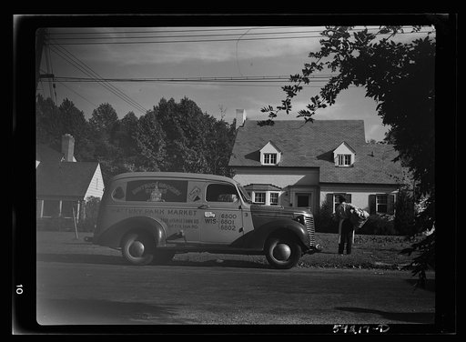 Untitled photo, possibly related to: Bethesda, Maryland. A Battery Park Market truck on the door of which is displayed a United States Truck Conservtion Corps pledge