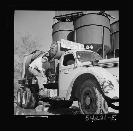Washington, D.C. A Jaeger truck-transit mixer, showing a man operating the mixer. On the door of the truck is the United States Truck Conservation Corps pledge