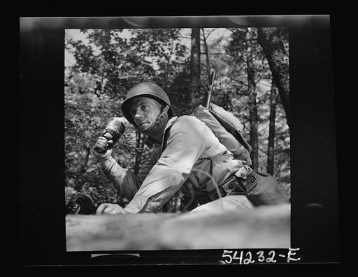Fort Belvoir, Virginia. A soldier throwing a hand grenade