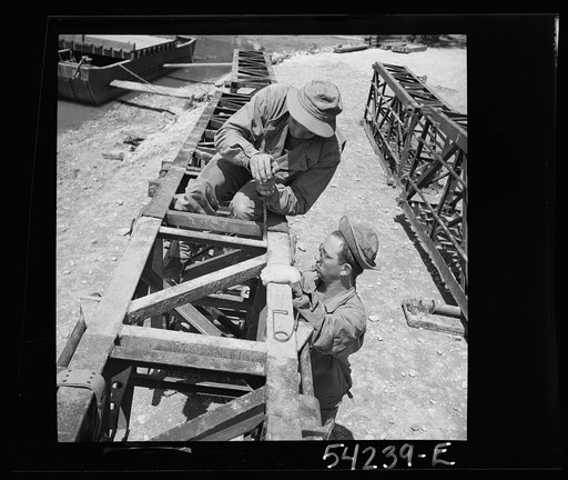 Fort Belvoir, Virginia. United States Army engineers constructing a bridge or a pier