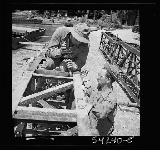 Untitled photo, possibly related to: Fort Belvoir, Virginia. United States Army engineers constructing a bridge or a pier