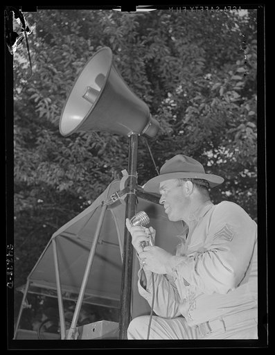 Fort Belvoir, Virginia. A sergeant issuing orders over a loud speaker