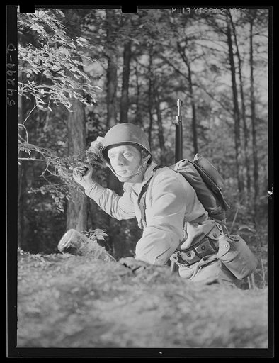 Untitled photo, possibly related to: Fort Belvoir, Virginia. A soldier throwing a hand grenade