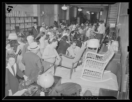 Washington, D.C. A crowd milling through the Adam A. Weschler & Son store where an auction sale is to be held