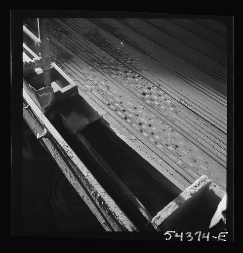 Kingman (vicinity), Arizona. Concentrating tungsten ore on tables in a recovery plant near the Boriana mine