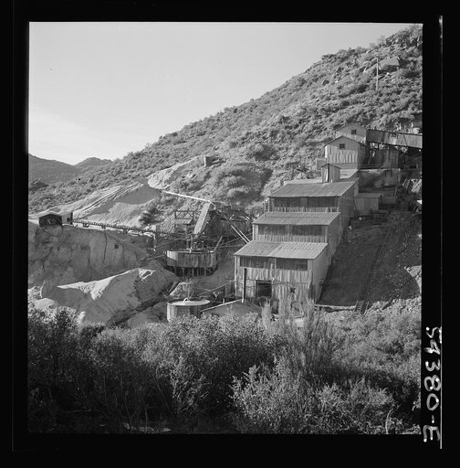 Kingman (vicinity), Arizona. A view of the plant where the tungsten ore, mined at the Boriana mine, is processed. Sagebrush and cacti cover the desert mountains surrounding the plant