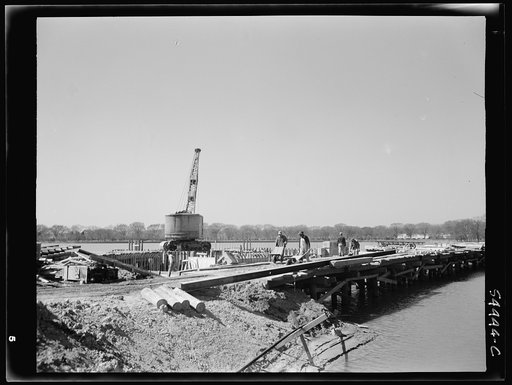 Construction of a million dollar bridge across the Tidal Basin. Archie A. Alexander, Negro, senior partner