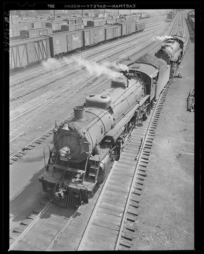 Untitled photo, possibly related to: Chattanooga, Tennessee. Freight cars and oil tanks in the railroad yards