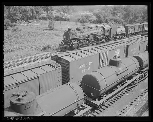 Untitled photo, possibly related to: Chattanooga, Tennessee. Freight cars and oil tanks in the railroad yards