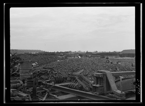 Boston and Maine railroad shops at Billerica, Massachusetts. Tremendous piles of spikes will be sorted out according to size and put away in kegs for salvage purposes