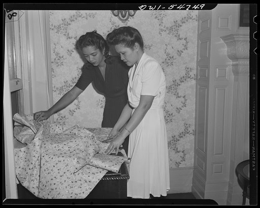 Philippine Woman's Club, Washington, D.C. Left to right: Miss "Nina" Zenaida Quezon, daughter of late President Manuel L. Quezon of Philippine Commonwealth and Mrs. Josefa Rustia, wife of Major Guillermo Rustia, United States Army Medical Corps serving with Merrill's Mauraders in Burma