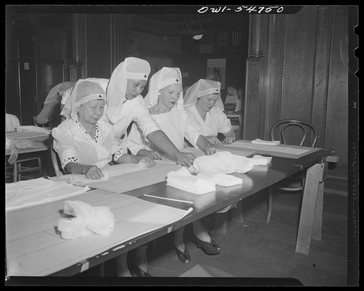 Filipino American Red Cross surgical dressing unit, Washington, D.C. Left to right: Mrs. en Carnacion Orense, Manila; Mrs. Narcisa Ancunciacion Pagasianigan, Philippines, Mrs. Bonner Fellers, formerly Manila; Mrs. J.F. Cotton, Manila