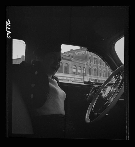 Untitled photo, possibly related to: Portrait of a woman training to operate buses and taxicabs
