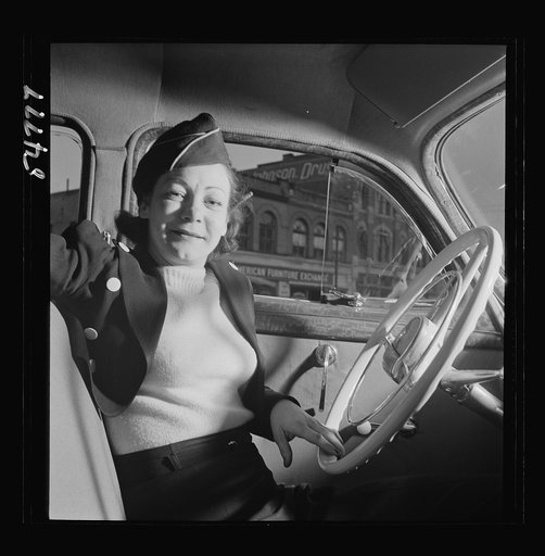 Portrait of a woman training to operate buses and taxicabs