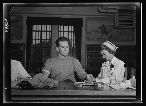 A young prisoner at San Quentin has his temperature and pulse recorded before giving blood to the Red Cross blood bank