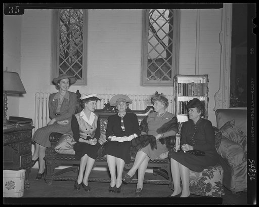 Washington, D.C. Guests attending a kitchen shower for the Walsh Club for war workers. Left to right, Mrs. Leon Henderson, Mrs. Warren Lee Pearson, Mrs. Jesse Jones, and Mrs. Henry Wallace