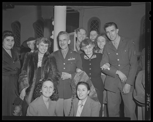 Washington, D.C. A few of the guests and entertainers attending the kitchen shower of the Walsh Club for war workers. Left to right: Mrs. Marion McGregor, in charge of publicity for music for the services; Brigadier General Stuart Godfrey; engineer officer with the Airborne Aviation Engineers; Mrs. 