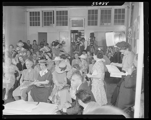 New York (and vicinity), New York. Miscellaneous photograph relating to the war effort. Woman volunteers who check and post ceiling prices for the U.S. Office of Price Administration (OPA)
