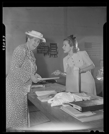 New York (and vicinity), New York. Miscellaneous photograph relating to the war effort. Woman volunteers who check and post ceiling prices for the U.S. Office of Price Administration (OPA)
