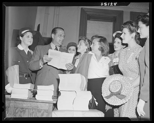 New York (and vicinity), New York. Miscellaneous photograph relating to the war effort. Woman volunteers who check and post ceiling prices for the U.S. Office of Price Administration (OPA)