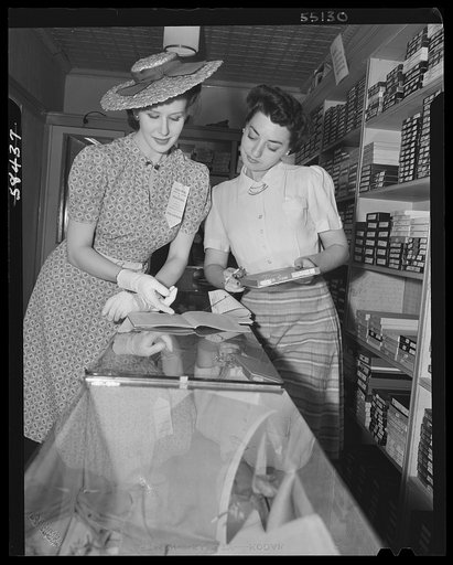 New York (and vicinity), New York. Miscellaneous photograph relating to the war effort. Woman volunteers who check and post ceiling prices for the U.S. Office of Price Administration (OPA)