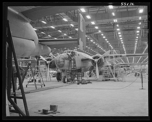 Kansas City, Kansas. The interior of an assembly line, showing a B-25 bomber in the foreground of the North American Aviation Inc. plant