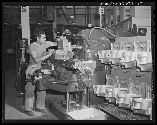 Castings for the landing gear of a North American P-51 are machined on this huge mill