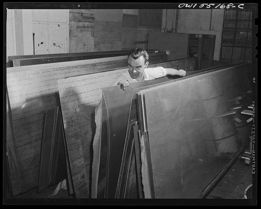 In the receiving stockroom, sheet metal is placed on carts ready for shipment to the sheet metal preparation department as it is needed