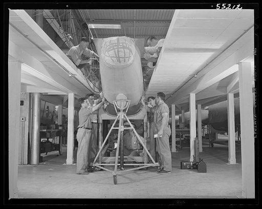 Kansas City, Kansas. Men working on two floors, assembling parts of a B-25 bomber, at the North American Aviation Inc. plant