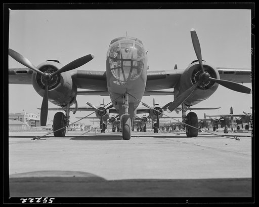Kansas City, Kansas. B-25 bombers on the outdoor assembly line at North American Aviation, Inc., almost ready for their first test flight