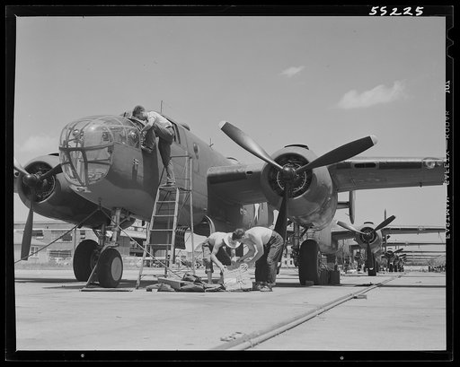 Kansas City, Kansas. B-25 bombers and tractors that haul them on the assembly line at North American Aviation, Inc. The planes are ready for their first test flight