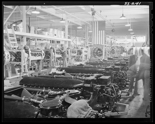 Inglewood, California. Interior view of the engine assembly department of North American Aviation, Inc., show long lines of mounted Allison motors for the B-51 fighter planes and Wright motors for the B-25 bomber planes (distant)
