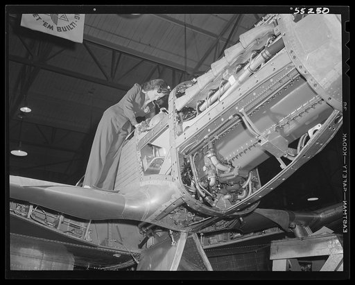 North American Aviation's new P-51 Mustang fighter for the United States Army Air Forces receives its final assemblies before moving out the door to the flight ramp