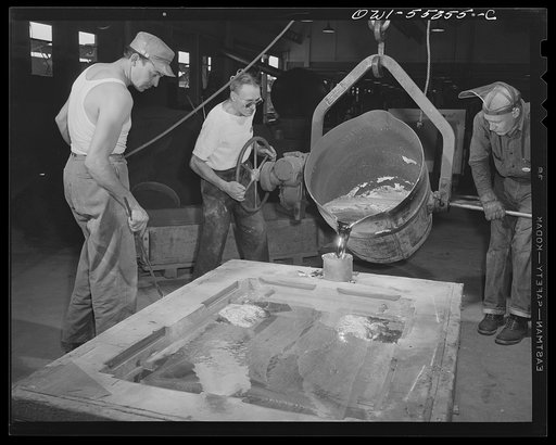 In North American's foundry, kirksite is poured into a mould to be used in press to shape plane parts