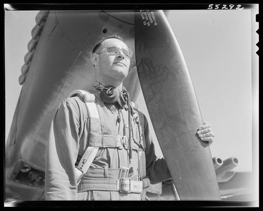 Captain C.R. Douglass, Assistant Army Air Forces Representative at North American Aviation, looks aloft before taking another P-51 fighter into the air for a routine test flight