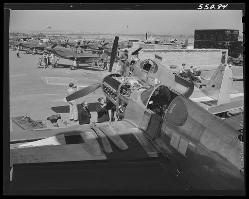 A partial view of North American's flight ramp, with P-51 fighters getting final adjustments before flight tests and paint