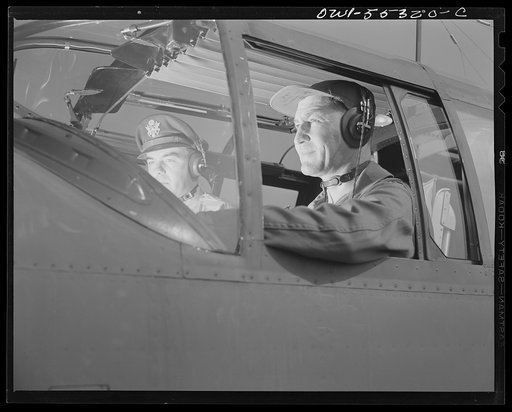Army Air Force test pilots prepare to make a routine test flight in a North American B-25 bomber prior to acceptance by the Army