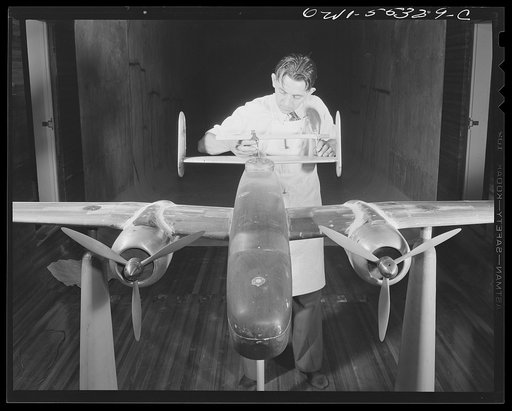 A scale model of North American's B-25 bomber is placed in the company's new wind tunnel